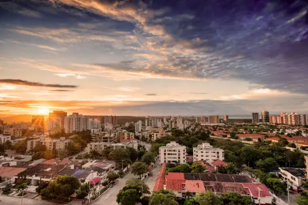 Aerial view of Barranquilla, Colombia towards the river at sunset