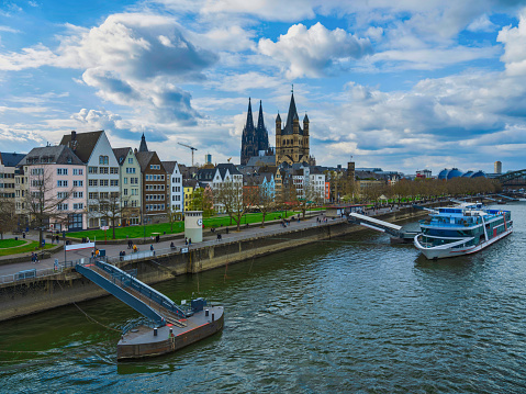 Cologne harbour, traditional buildings and Cathedral tower in Germany