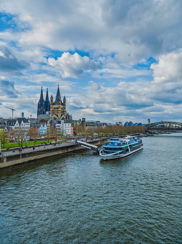 Cologne harbour, traditional buildings and Cathedral tower in Germany