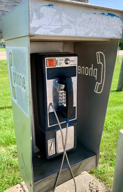istock Retro coin-operated pay phone from car 1403734896