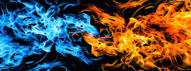 istock 3D illustration of red and blue fire swirling 1403741329
