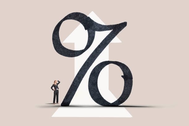 istock Woman Looking up At Riging Interest Rate Symbol 1403741567