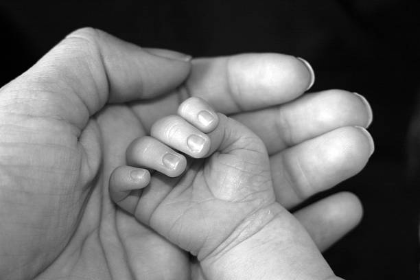 istock Hands of a baby and mother 140374894