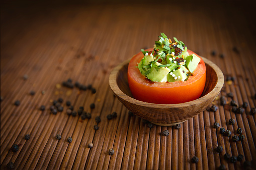 Vegan recipe with avocado and  tomatoes