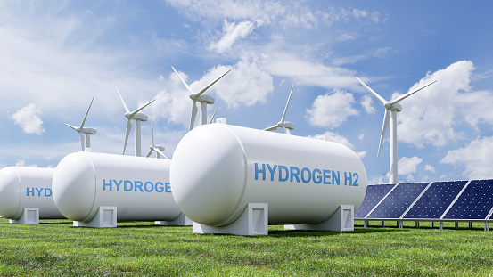 Hydrogen energy storage gas tank for clean electricity solar and wind turbine facility.3d rendering