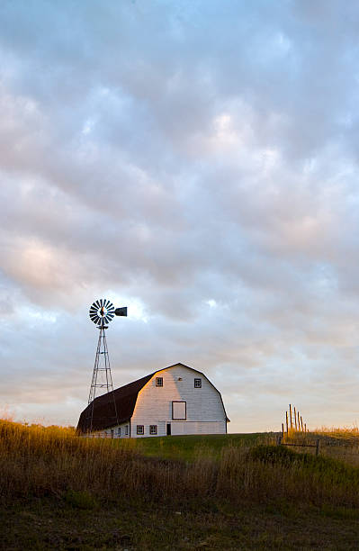 istock Sunrise over prarie farm 140375106
