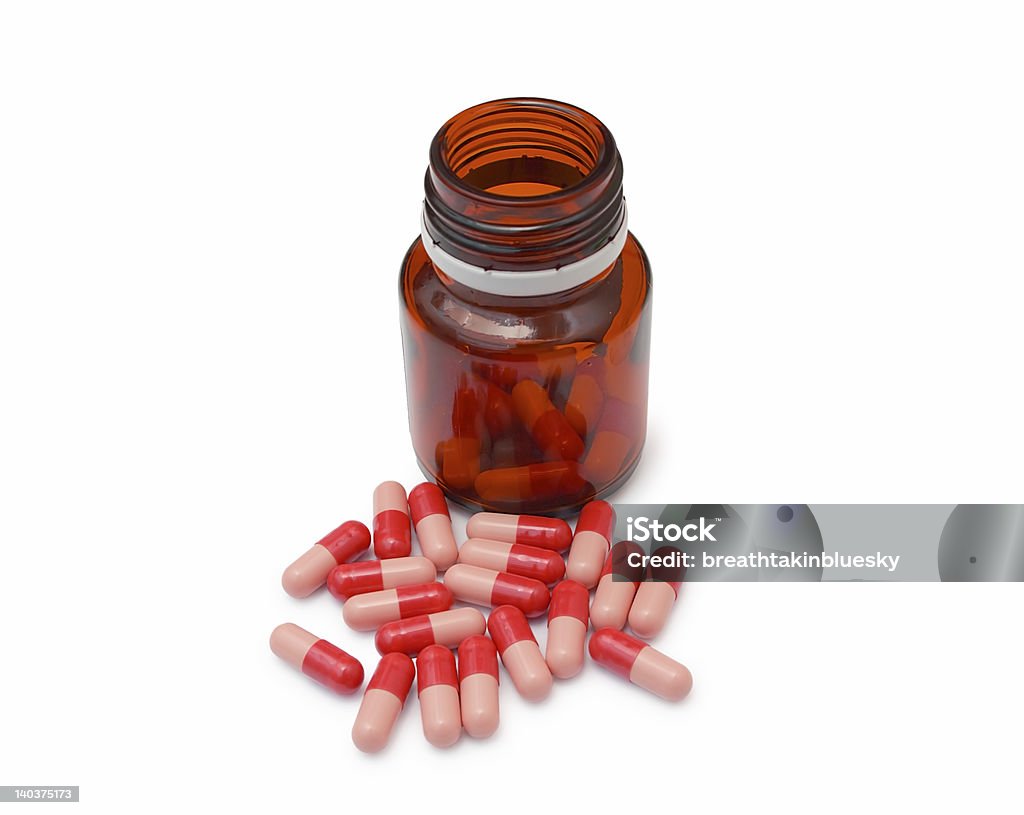 Красный антибиотиков таблетки - Стоковые фото Антибиотик роялти-фри