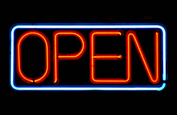 istock Open sign in neon lights against a black background 140375405