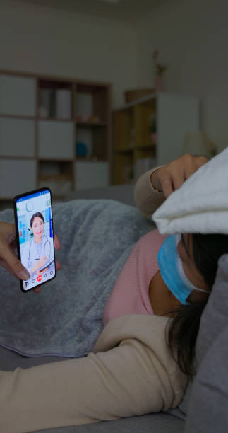 istock sick woman telemedicine 1403755512