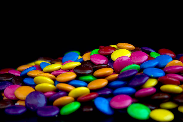 candy on black stock photo