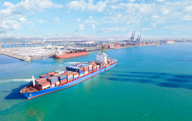 istock Aerial top view container cargo ship in tracsesion  port import export 1403759750