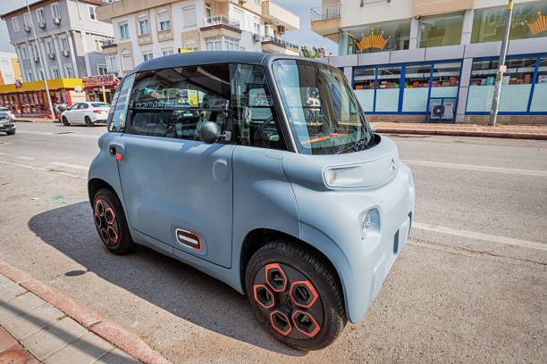 Citroen Ami mini electric car parked at the city street. Tiny and funny modern eco transport stock photo