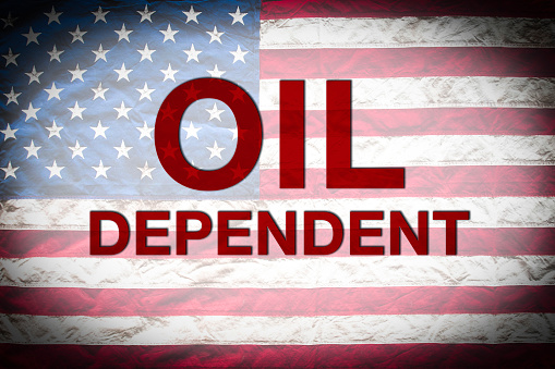 Oil dependent with US flag.