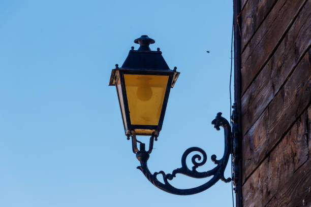 istock Vintage iron lantern on a house wall 1403772402