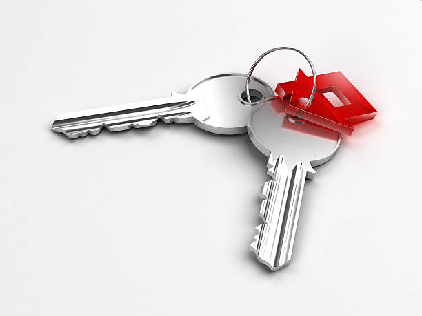 Deux clés de la maison d'argent en rouge - Photo