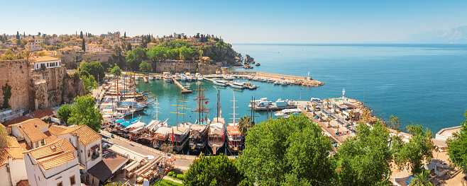 Aerial view of the picturesque bay with marina port with yachts near the old town of Kaleici in Antalya. Turkish Riviera and resort paradise