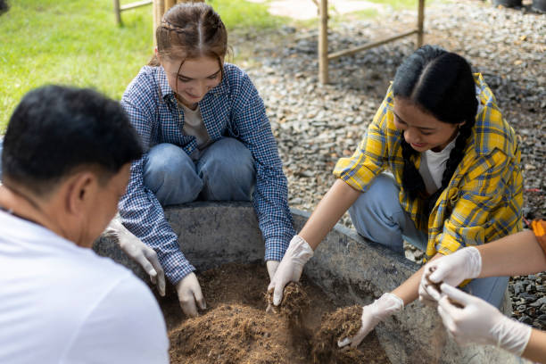 istock Happiness children study learning to prepare the soil before planting vegetables. 1403773496