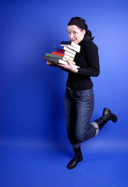 istock woman with books 140377363