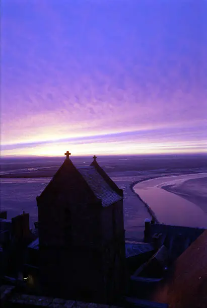 Early morning on the French coast as seen from Mont St. Michel, France.