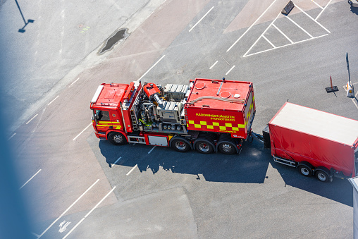 Gothenburg, Sweden - May 29 2022: Overhead view of a large fire truck with a water cannon