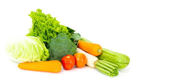 istock Assorted vegetables radish, tomato, carrot, chinese cabbage, broccoli, bitter gourd, chinese kale on a white background 1403779683