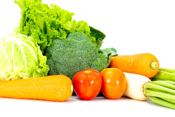 istock Assorted vegetables radish, tomato, carrot, chinese cabbage, broccoli, bitter gourd, chinese kale on a white background 1403779686