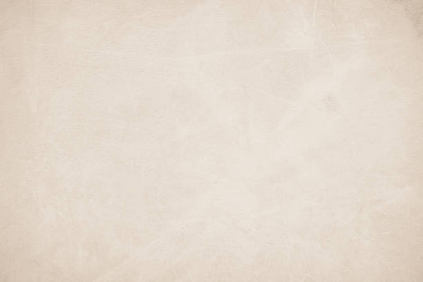 istock Old concrete wall texture background. Close up retro plain beige color cement material surface rough for show or advertise promote product content on display and brown paper design element concept. 1403782171