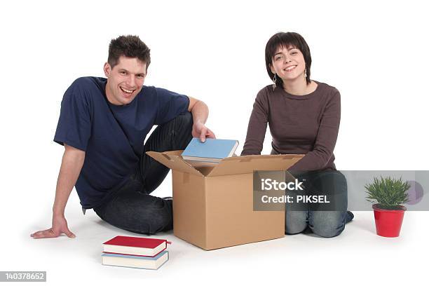 Couple Unpacking Boxes Stock Photo - Download Image Now - Adult, Adults Only, Beginnings
