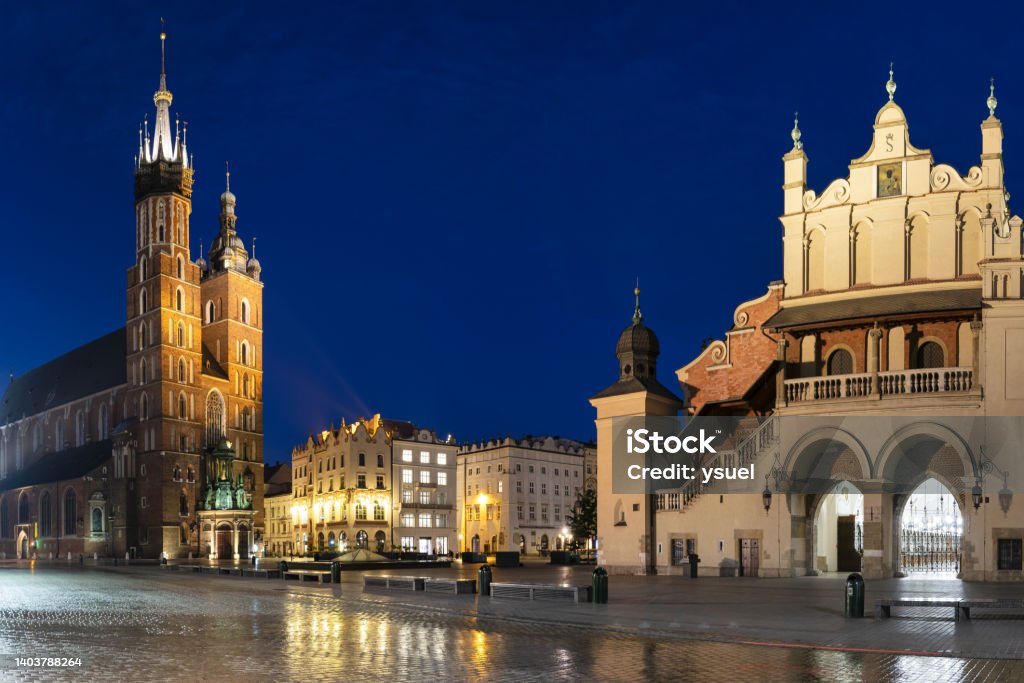 Krakow Old Town at night creative 4 Night panorama of the Market Square in Krakow. Poland. Poland Stock Photo