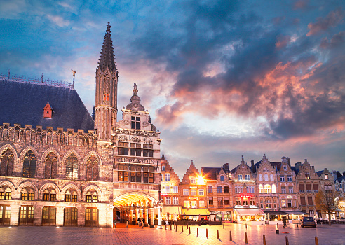 Main square with town hall in Ypres by twilight