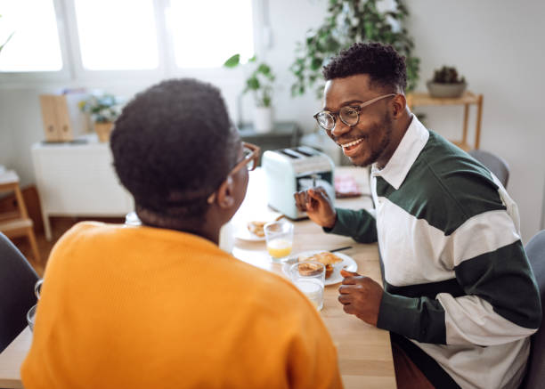 istock Happy couple having fun during breakfast time at home 1403789733
