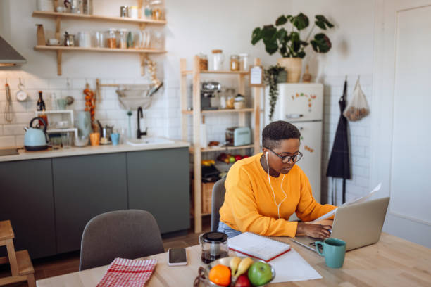 istock Young woman working form home 1403789741