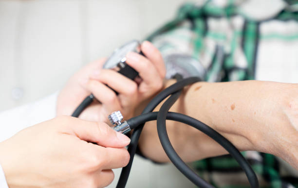 istock Scaled up look on nurse checking arterial pressure 1403791615
