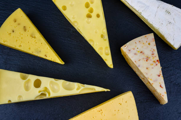 istock Various types of cheese on a slate board. Top view 1403792043