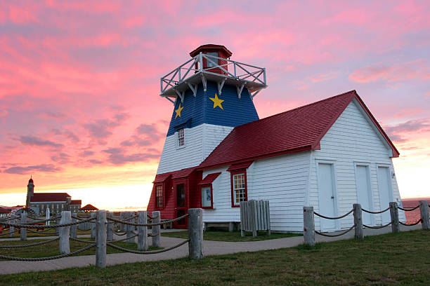 Grande-Anse Lighthouse at sunset stock photo