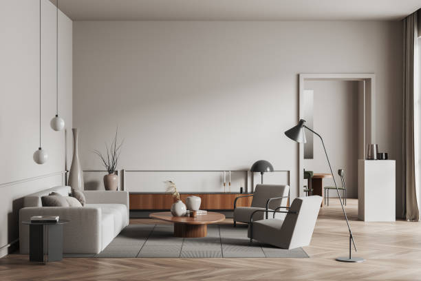 istock Modern relax interior with couch and chairs, dresser and mockup 1403793202