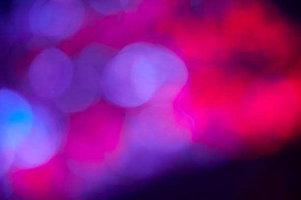 istock Abstract red and blue defocused lights background 1403793230