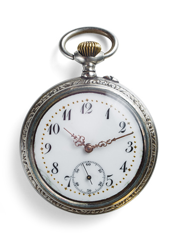 Antique early 20th century gold, open-faced, Waltham pocket watch. The gold and white enamel watch face reads 5:55 with an additional seconds dial at 30 seconds. The outer gold base has intricate gold detailing and a top winding stem with a fob chain attached. This beautiful vintage timepiece is isolated on a white background.