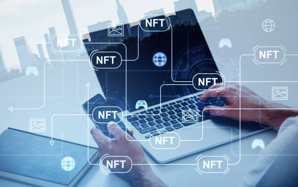 istock Businessman holding smartphone typing on laptop. Digital interface with nft 1403794355