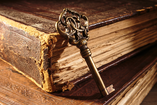 The old key with ancient books.