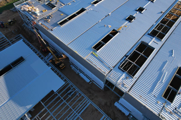 istock Warehouse Construction from metal structure. Industrial building on light gauge steel framing. 1403795699