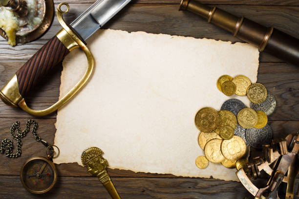 old paper scroll on the captain's desk. vintage still life. the concept of adventure and treasure hunting. - naval ship imagens e fotografias de stock