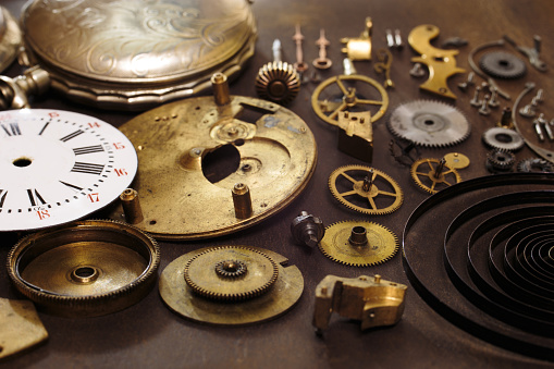 Vintage pocket watch mechanism parts. Details of clockwork mechanism close-up.