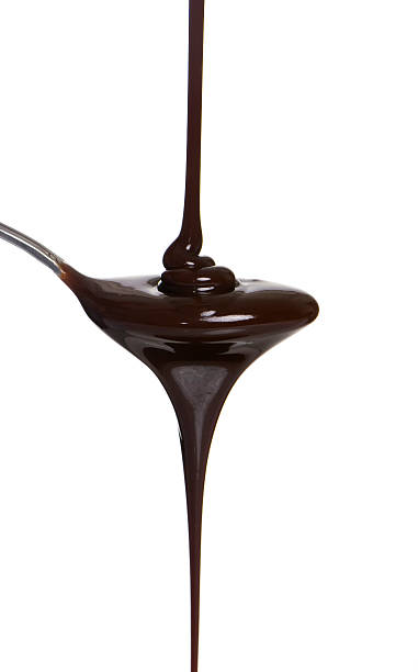 istock Chocolate syrup dripping off of a spoon 140380054