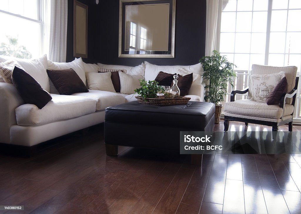 Modern Living Room Living room with furnishings in a new house with beautiful wood floors! Armchair Stock Photo