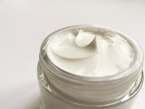 Moisturizer, cosmetic cream on the white background