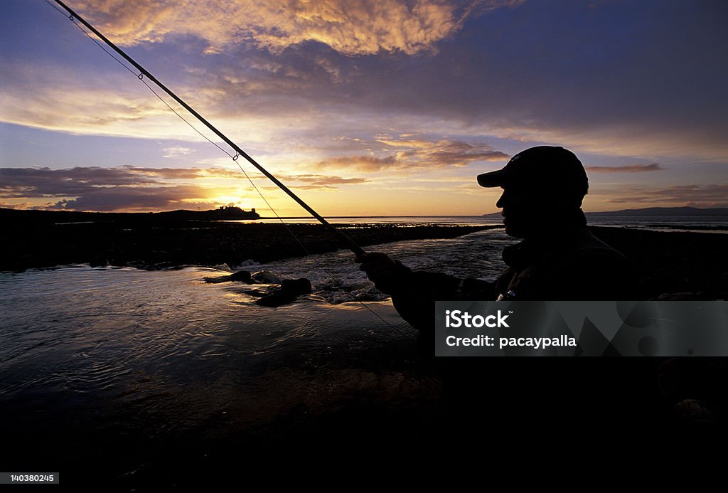 Pôr do sol e pescadores com mosca - Foto de stock de Pescaria com Iscas Artificiais royalty-free