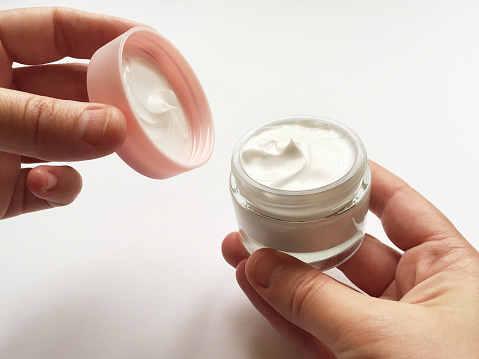 Face and Hand Cream,  On isolated white background