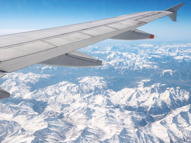 istock Airplane wing. View from plane window. Travel and transport concept 1403803763