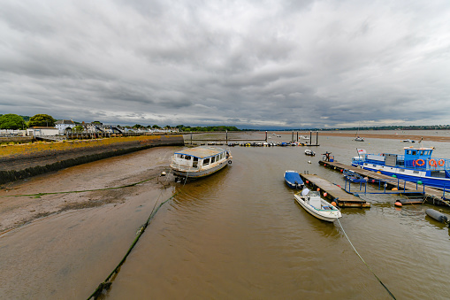 Boats on the estuary at Low Tide in Starcross in Devon. Near Dawlish and Exmouth.